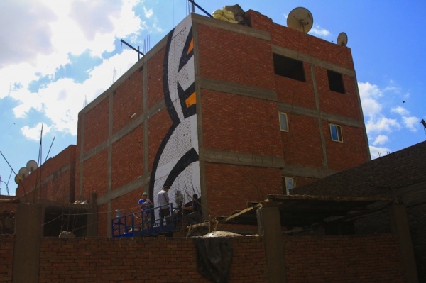 artist creates beautiful mural in cairo spanning across 50 buildings 2