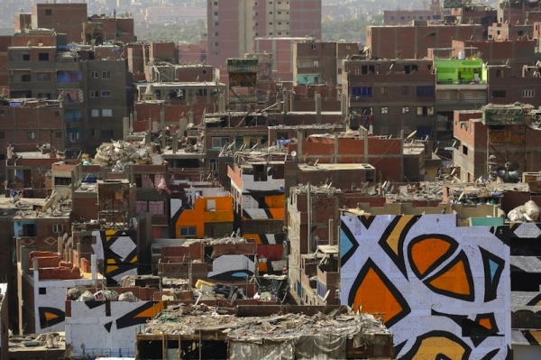 artist creates beautiful mural in cairo spanning across 50 buildings 3