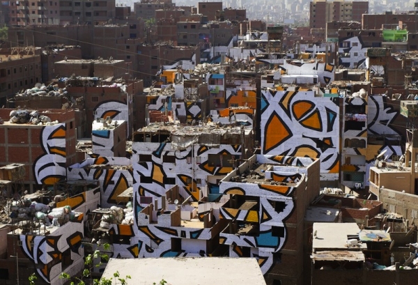 artist creates beautiful mural in cairo spanning across 50 buildings 10