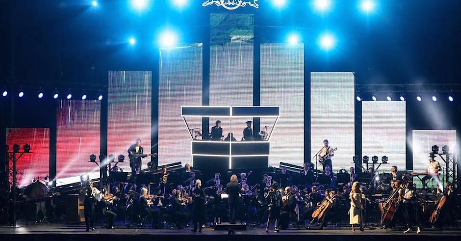 Watch bloody John Paul Young join Flight Facilities and the SSO for Love Is In The Air
