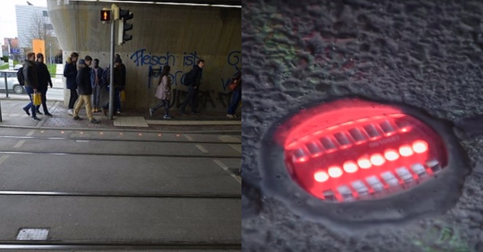 German town installs traffic lights on ground for people on their phones to see